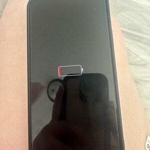 Black Smartphone with Low Battery Icon